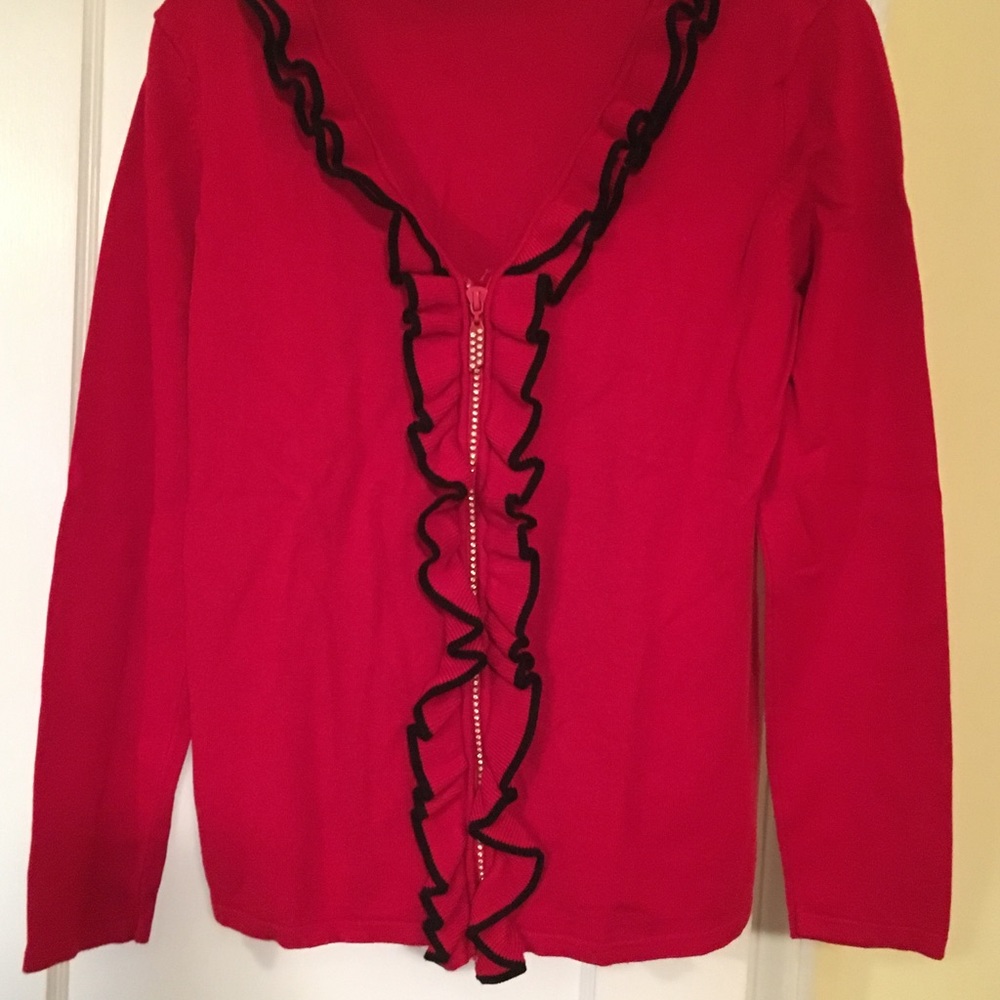Woman’s  red and black sweater